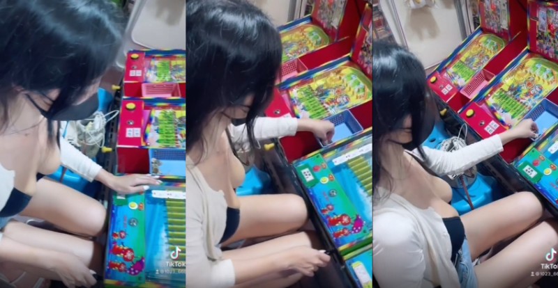 【BTC365币投】夜市遊戲攤驚見口罩妹「爆乳打彈珠」　胸前自備兩顆渾圓大珠子應戰